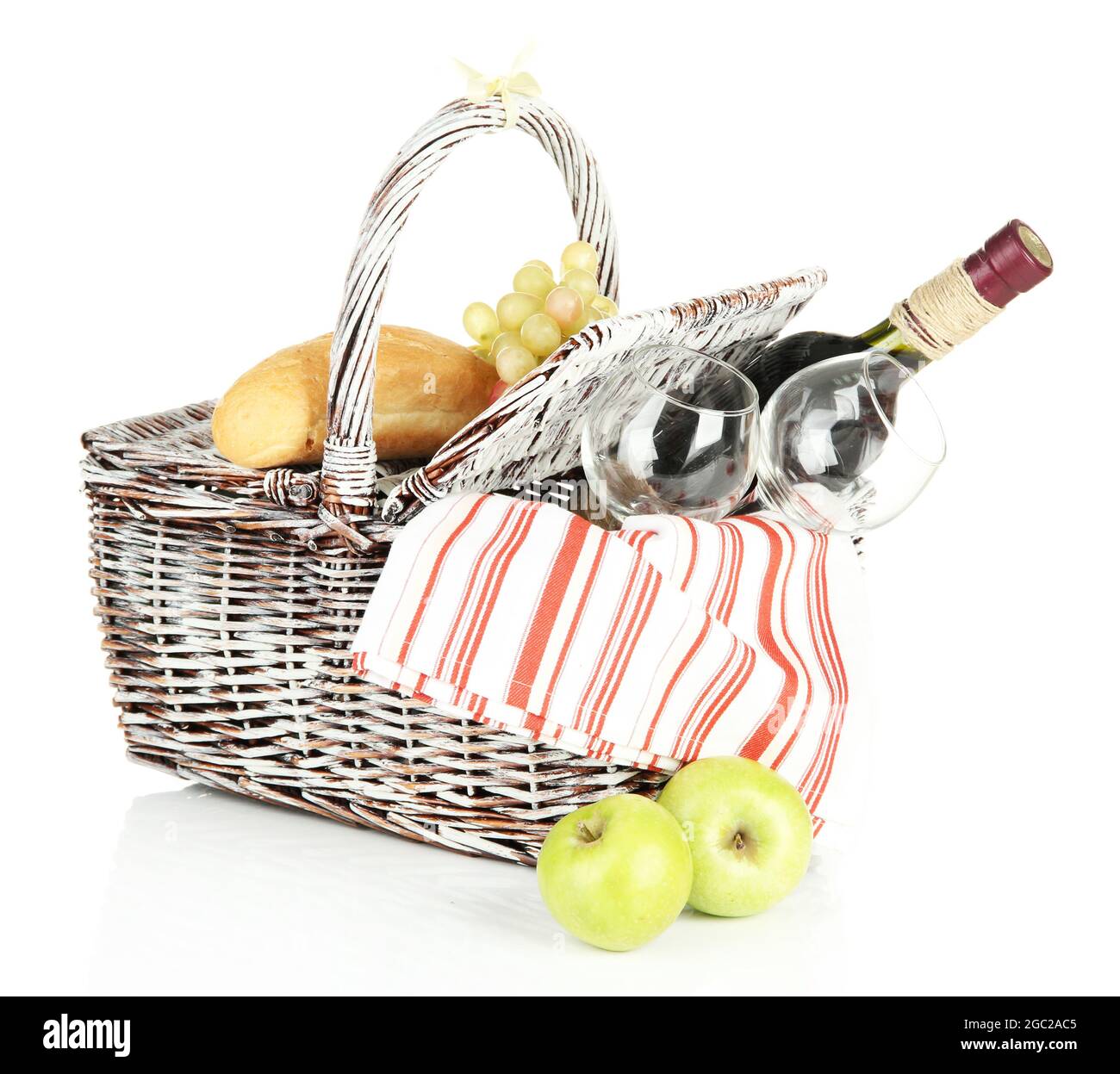 Picnic basket with fruits and bottle of wine, isolated on white Stock ...