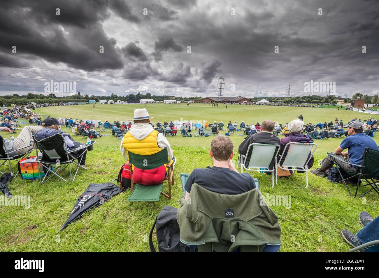 Seated cricket fans at the Royal London one day cricket match Nottinghamshire v Leicestershire, 2021 Stock Photo