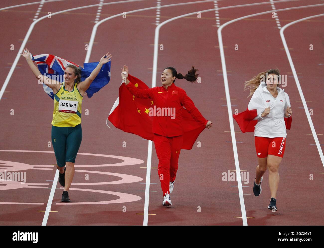 Tokyo, Japan. 06th Aug, 2021. Liu Shiying of China, Maria Andrejczyk of Poland and Kelsey-Lee Barber of Australia celebrate after winning the gold, silver and Bronze medals in the Women's Javelin Throw at the Tokyo 2020 Summer Olympic Games in Tokyo, Japan on Friday, August 6, 2021. Photo by Bob Strong/UPI Credit: UPI/Alamy Live News Stock Photo