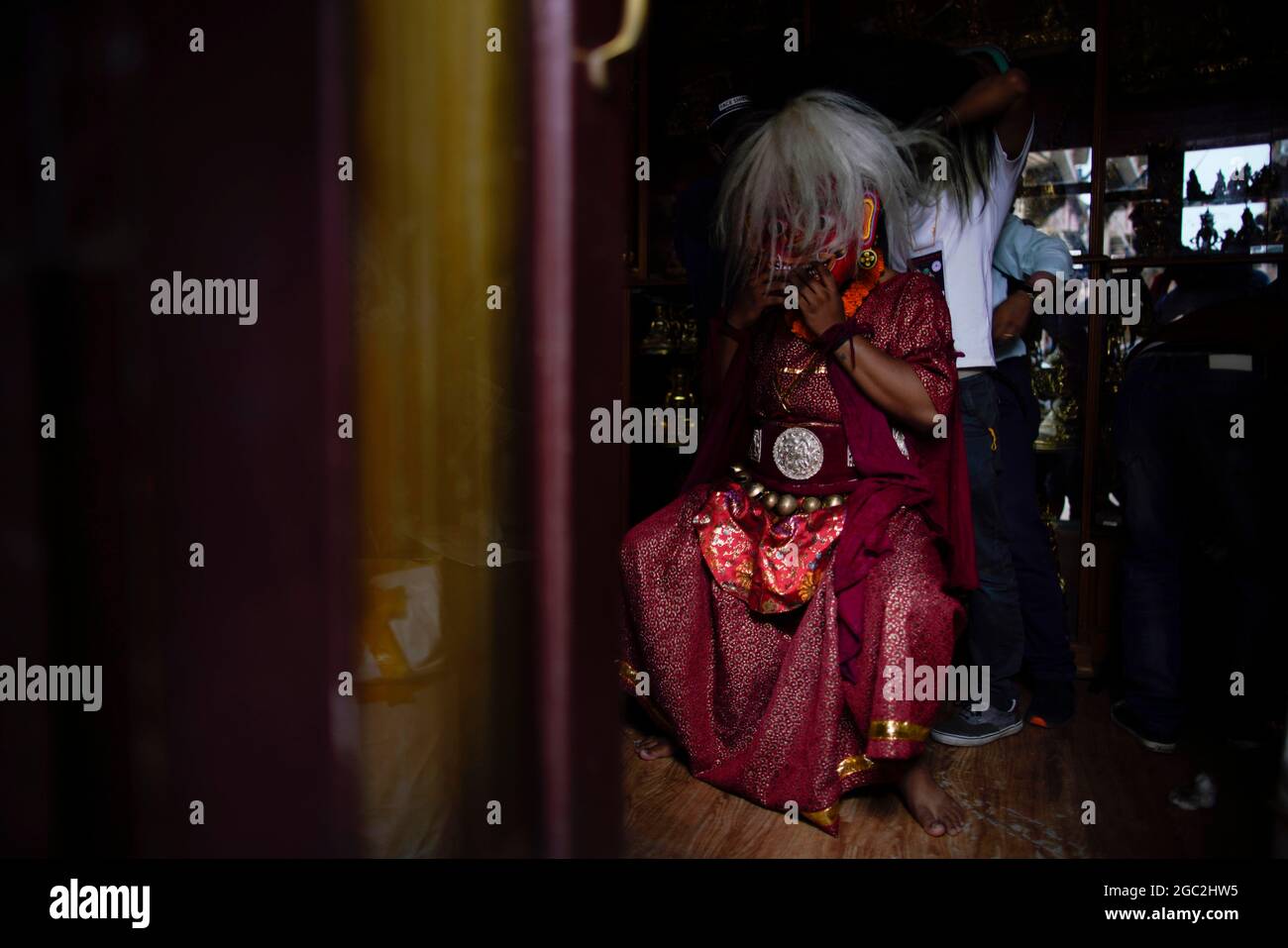 Lalitpur, Nepal. 6th Aug, 2021. A person dressed as a Lakhey gets ready before a tradition during Mi Pwa Lakhe the power of fire festival in Lalitpur, Nepal on Friday, August 6, 2021. (Credit Image: © Skanda Gautam/ZUMA Press Wire) Stock Photo