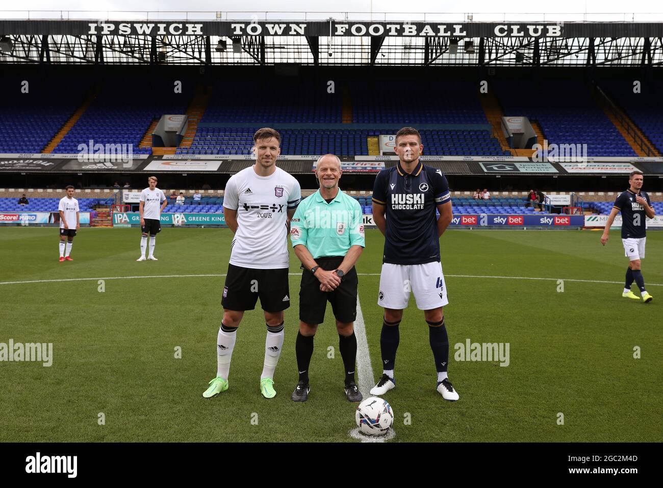 Lee Evans of Ipswich Town and Shaun Hutchinson of Millwall with Referee, Andy Woolmer pre kick off - Ipswich Town v Millwall, Pre-Season Friendly, Portman Road, Ipswich, UK - 31st July 2021 Stock Photo