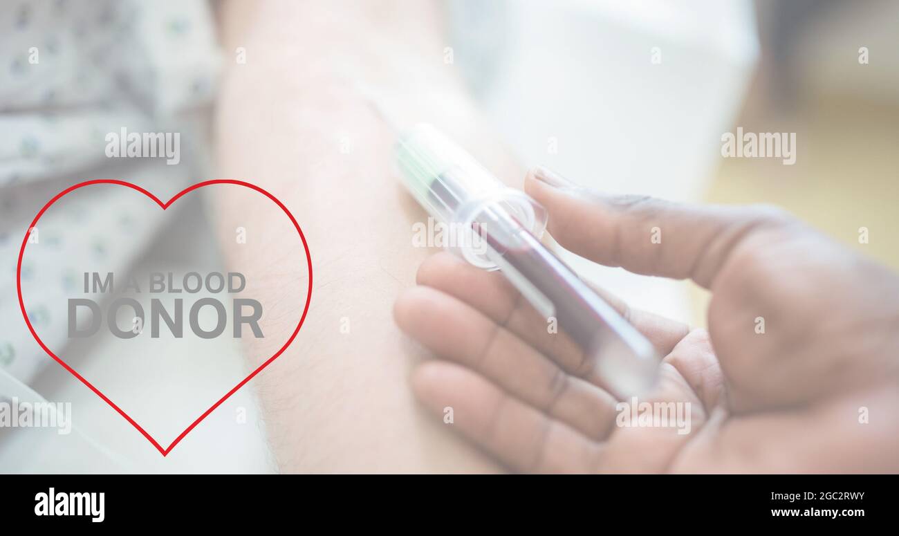 Composition of donate blood text over doctor drawing blood Stock Photo