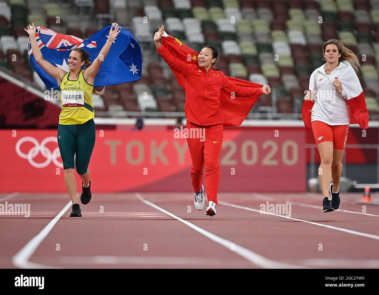 Tokyo, Japan. 6th Aug, 2021. (From L to R) Kelsey-Lee Barber of Australia, Liu Shiying of China and Maria Andrejczyk of Poland celebrate after the women's javelin throw final at Tokyo 2020 Olympic Games, in Tokyo, Japan, Aug. 6, 2021. Credit: Jia Yuchen/Xinhua/Alamy Live News Stock Photo