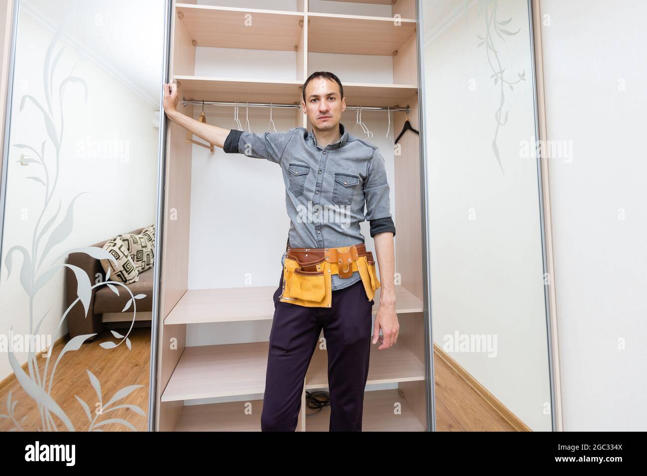 Closet Cabinets Contractor. Finishing Wooden Wardrobe by Professional ...