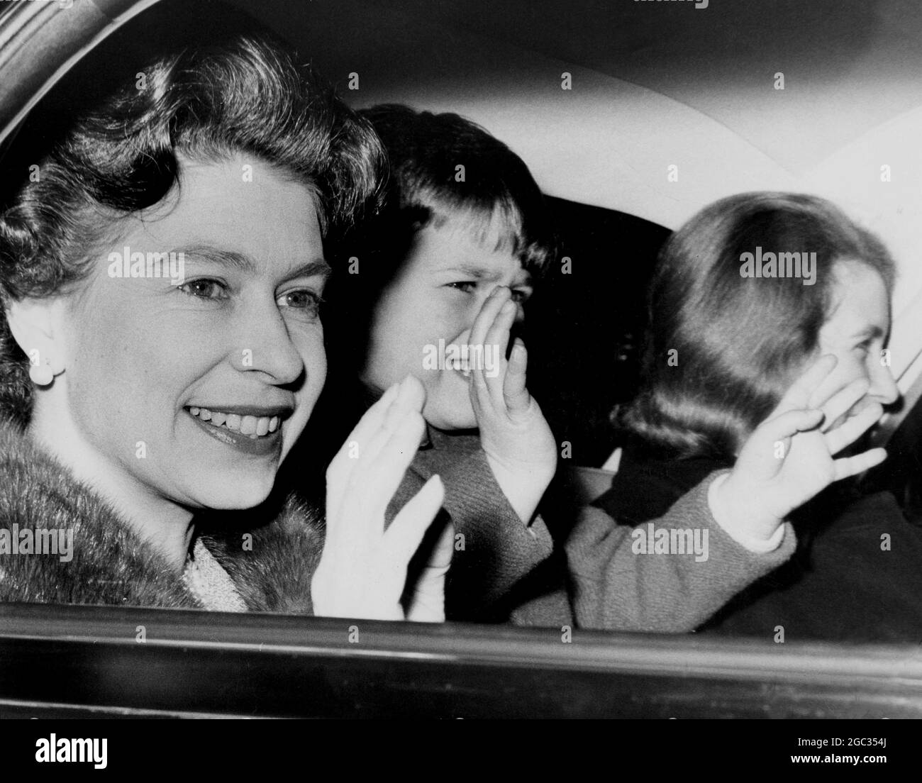 HM The Queen Elizabeth II with two of her children Prince Andrew and  Princess Anne leaving Buckingham Palace by car 23rd December 1965 Stock  Photo - Alamy