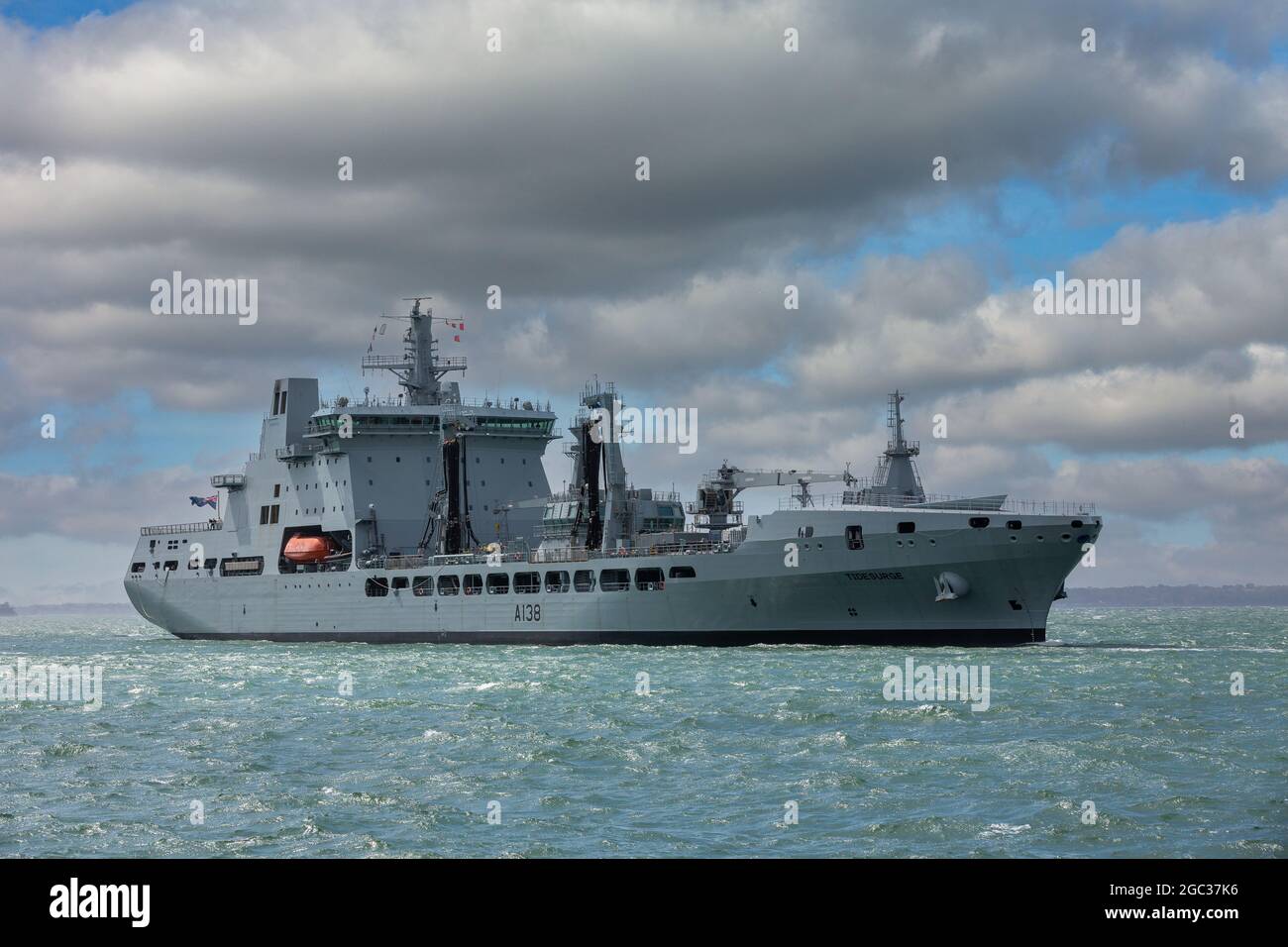Tide Class RFA Tidesurge (A138) arriving in Portsmouth Naval Base. A modern fleet support ship providing logistics and refuelling. Stock Photo