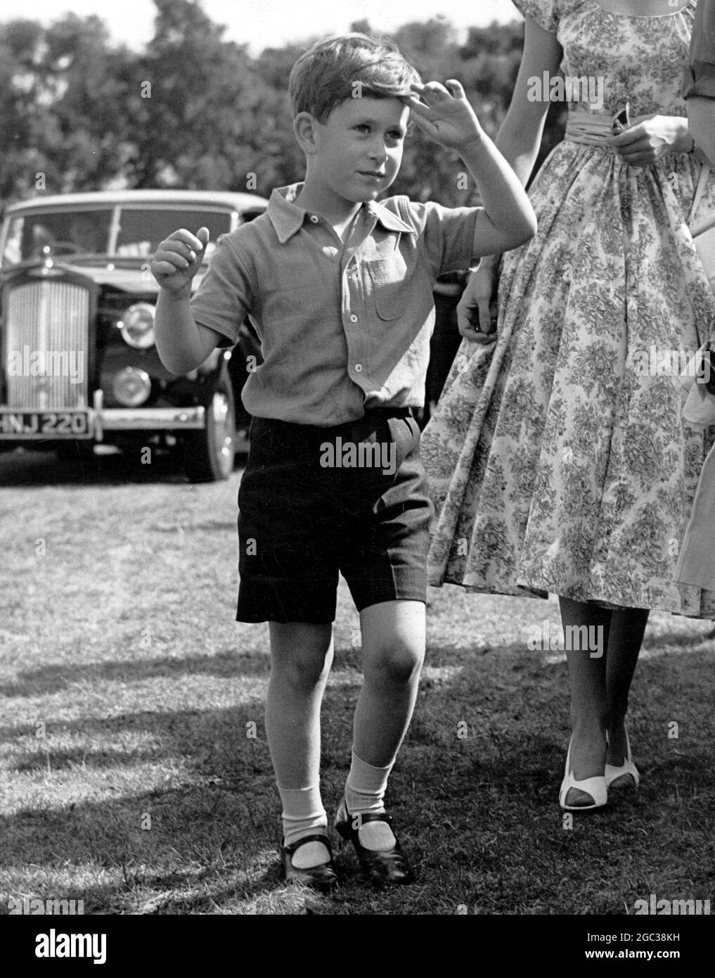 Prince Charles arrives on Smith's Lawn to watch polo June 1955 Stock Photo