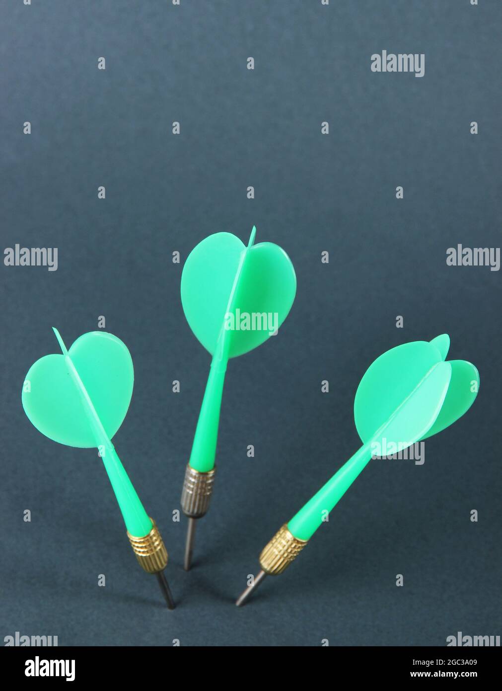 Darts on gray background Stock Photo Alamy