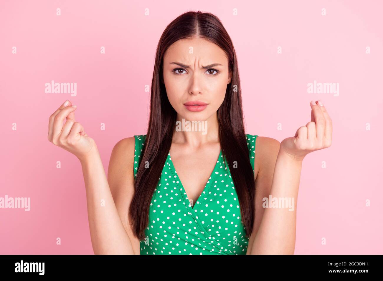 Photo portrait pretty brunette asking money angry unhappy isolated pastel pink color background Stock Photo