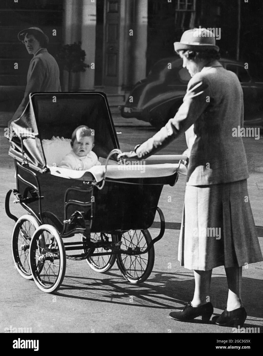 Prince Charles in his pram with his Nanny, Miss Lightbody. 1949 Stock ...