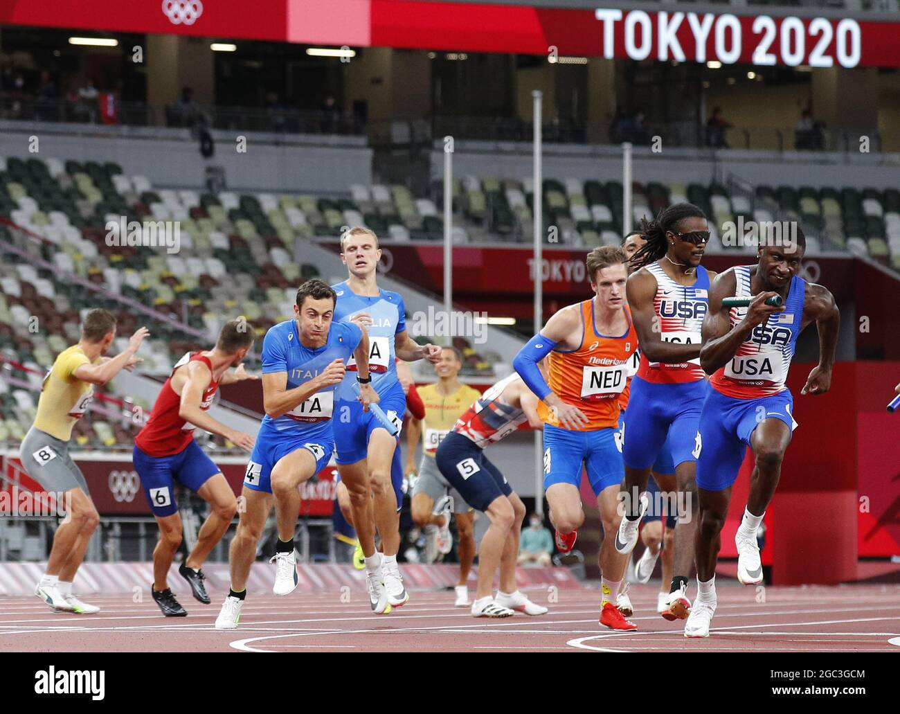 Tokyo, Japan. 06th Aug, 2021. Team Italy (L), Team Netherland's (C) and Team USA pass the baton in the Men's 4x100 Relay Finals at the Athletics competition during the Tokyo Summer Olympics in Tokyo, Japan, on Friday, August 6, 2021. Italy won the gold medal, Great Britain placed second and Canada came in third. Photo by Bob Strong/UPI. Credit: UPI/Alamy Live News Stock Photo