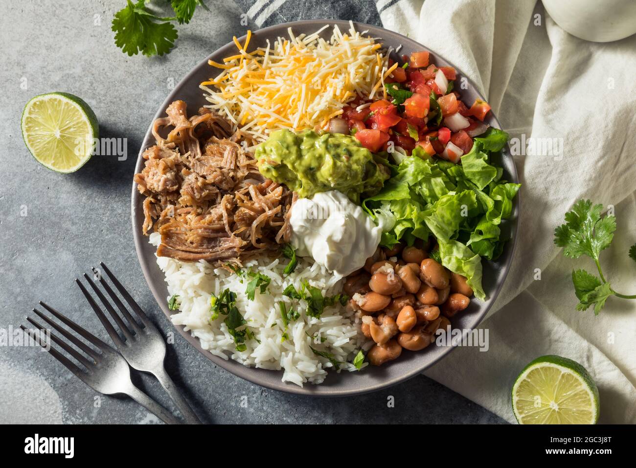 Healthy Homemade Mexican Carnitas Burrito Bowl Cilantro and Guacamole Stock Photo