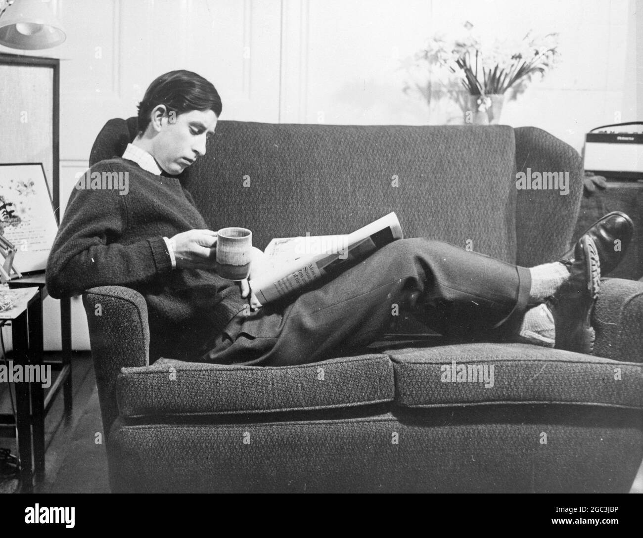 England Prince Charles relaxing in his study at Cambridge University . May 1969 Stock Photo