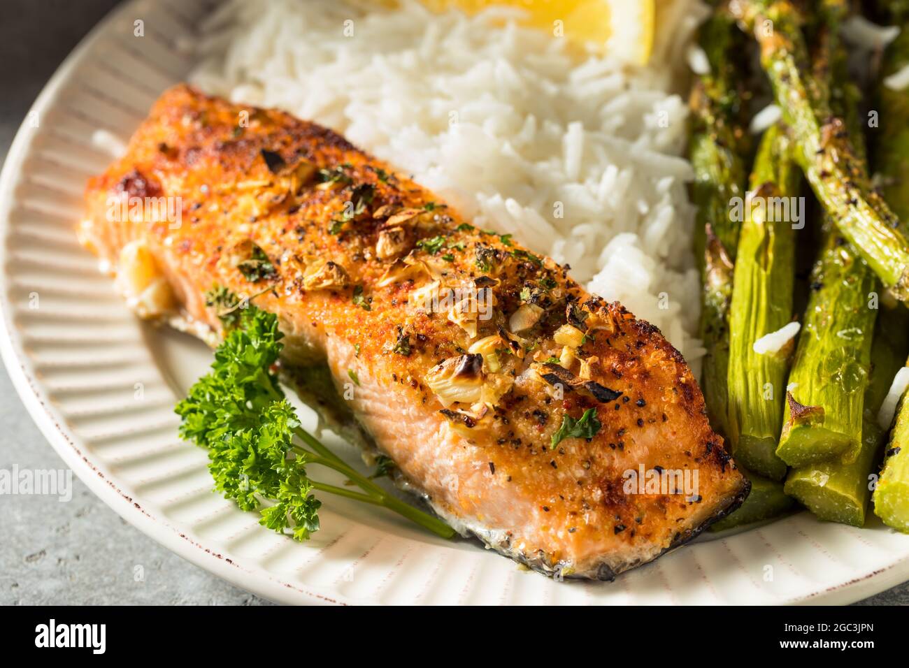 Healthy Homemade Roasted Salmon with Asparagus with Rice Stock Photo
