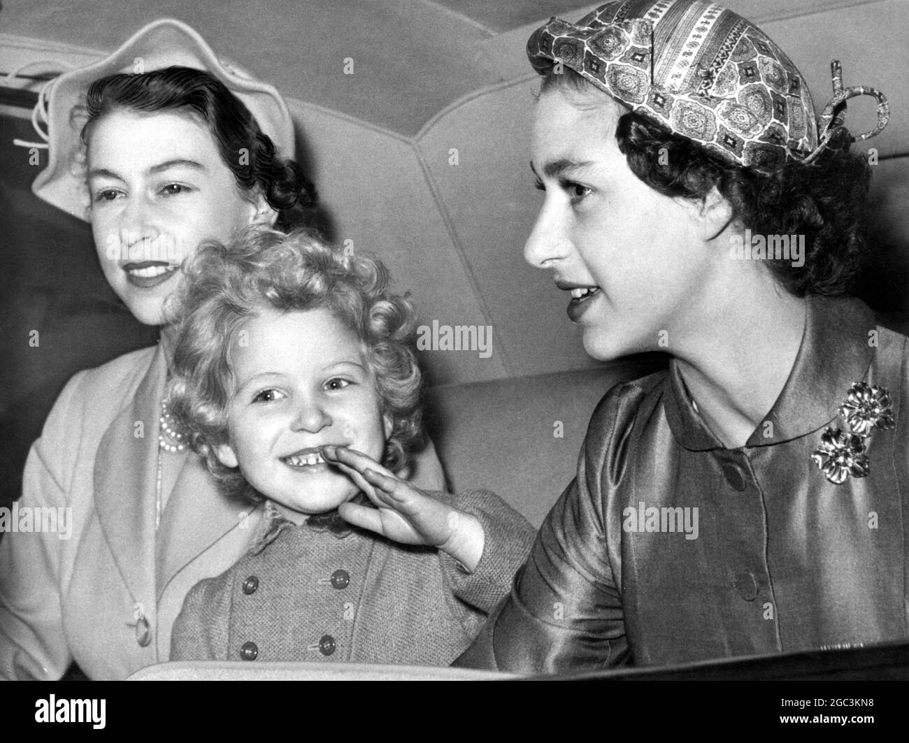 The Queen , Princess Margaret and Princess Anne seen in the Royal car ...