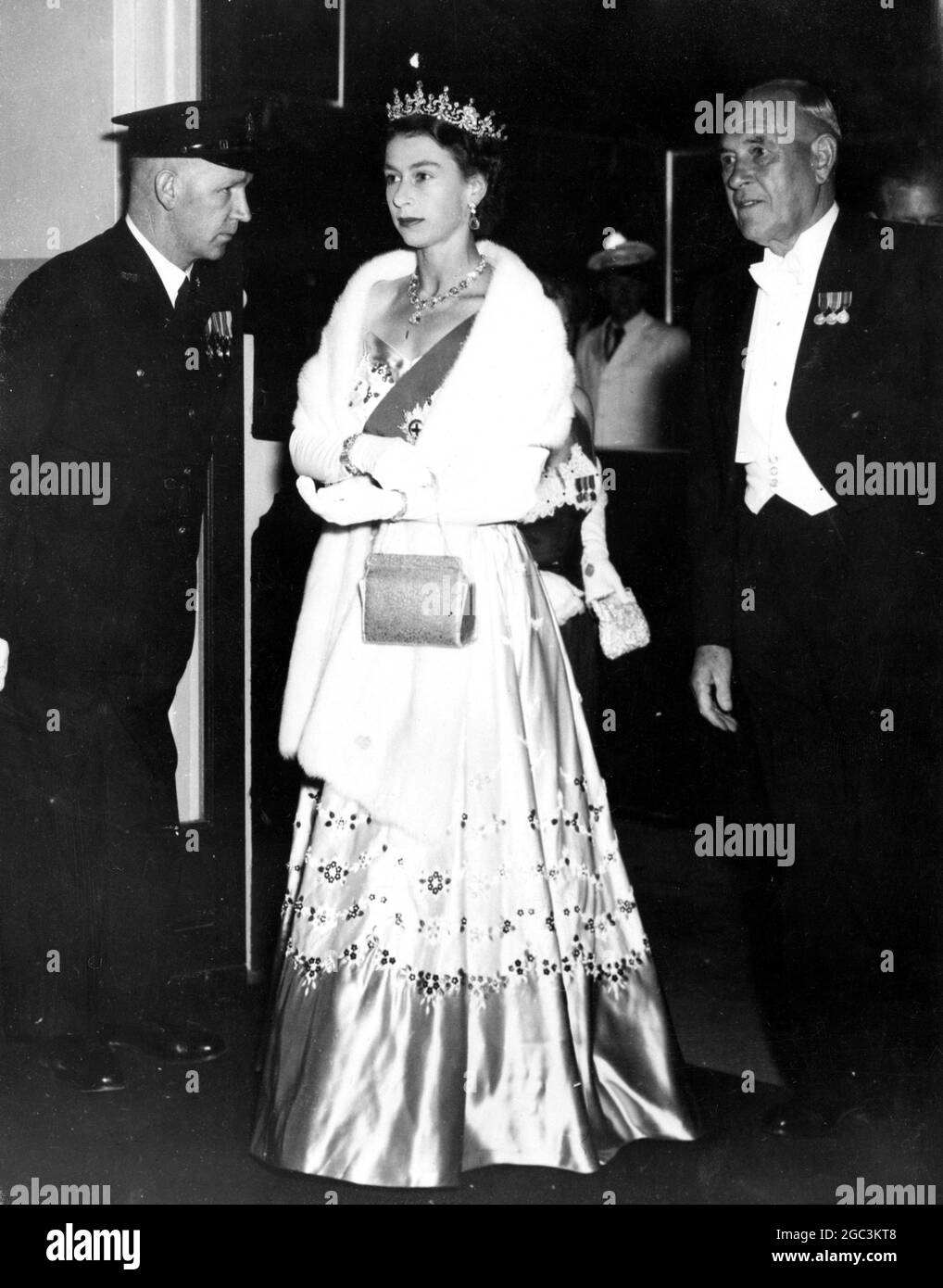 Queen Elizabeth II arriving at the State banquet with Premier J Cain of Victoria Melbourne Commonwealth Tour 5th March 1954 Stock Photo