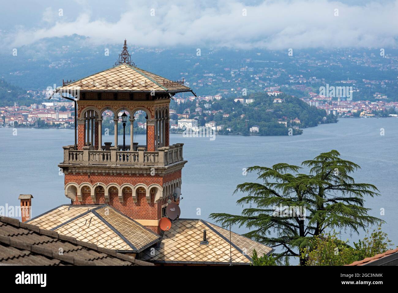 tower of a villa, Stresa, in the background Verbania, Lake Maggiore, Piedmont, Italy Stock Photo