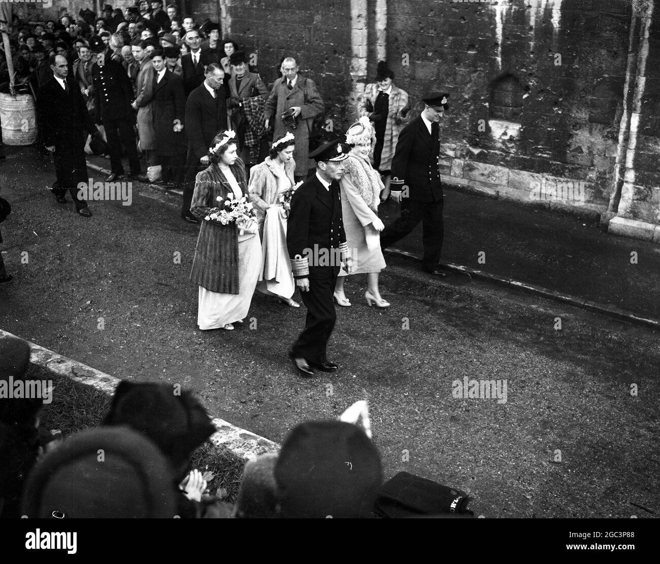 Three Royal Princesses were bridesmaids at the wedding of the Hon. Patricia Mountbatten to Captain the Lord Brabourne . Here , arriving at Romsey Abbey , are Princess Elizabeth , Princess Margaret , King George VI , Queen Elizabeth , and Lieutenant Philip Mountbatten 26 October 1946 Stock Photo