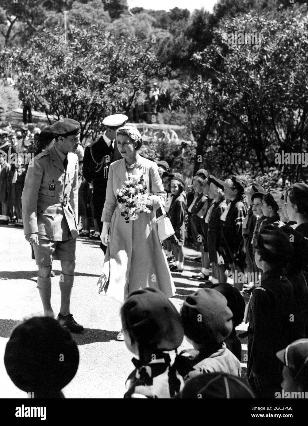During HM Queen Elizabeth II 's visit to Gibraltar , with the Duke of  Ediburgh , they reviewed the Boy Scouts and Girl Guides , Cubs and Brownies  in Almeda gardens .