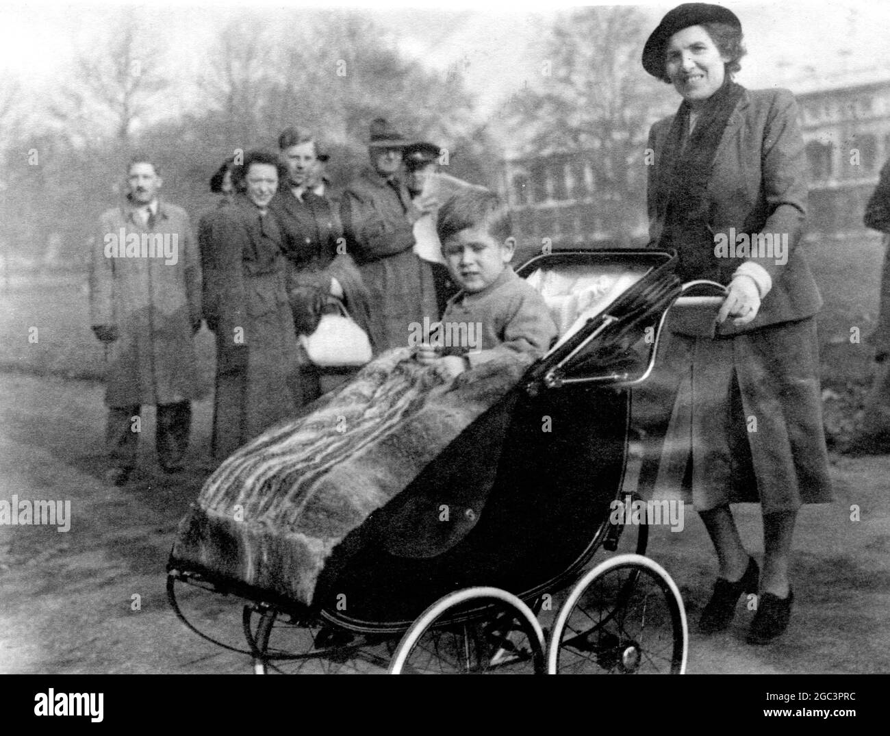 Prince Charles goes for a stroll in the park on his third birthday