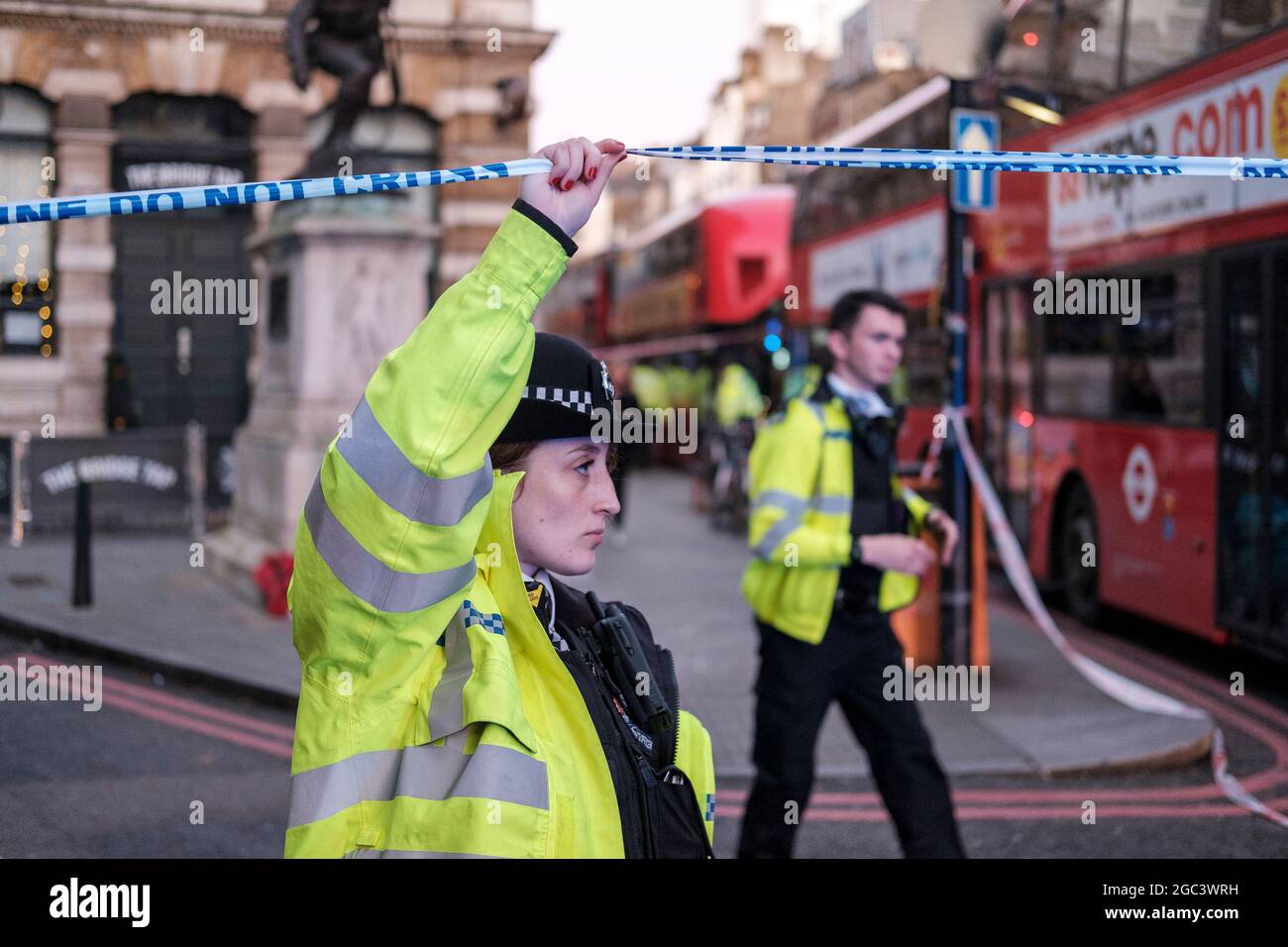 Female Police officer cordoning off a crime scene, during London Bridge terror attack on 29 of novemebr 2019, London, England Stock Photo