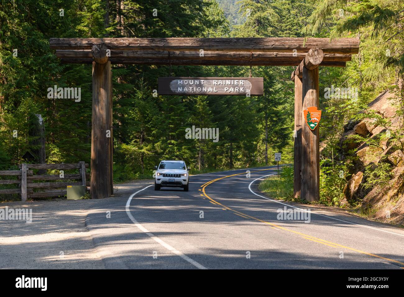 Mount Rainier, WA, USA - August 04, 2021; A car passes through the southern entrance to Mount Rainier National Park in Washington State Stock Photo