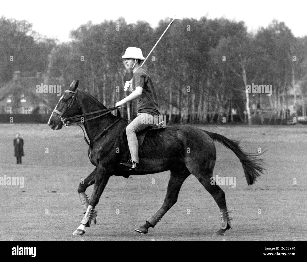 Polo at Smith's Lawn , Windsor . Prince Charles played a practice polo match , and was later joined in play by Prince Philip , who had previously played for Priar Park against the Household Brigade . Prince Charles with Polo stick over his shoulder rides out to play . 24 April 1965 Stock Photo