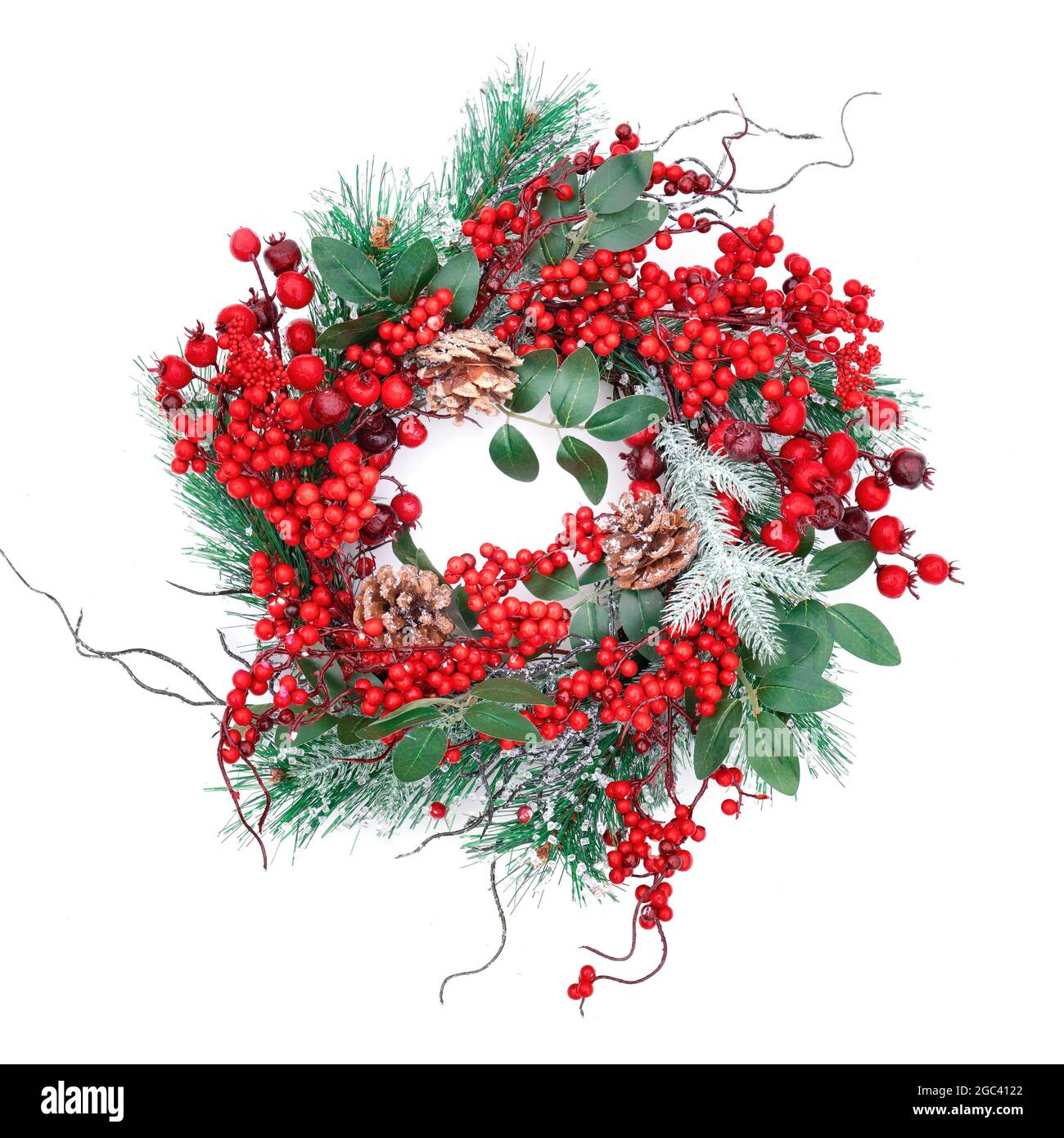 Christmas wreath with red berries isolated on a white background ...