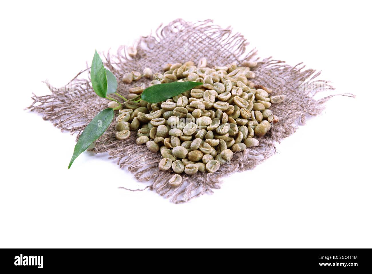 Green coffee beans and leaves isolated on white Stock Photo - Alamy
