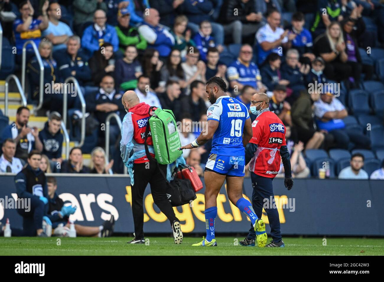 Leeds, UK. 06th Aug, 2021. King Vuniyayawa (19) of Leeds Rhinos leaves the  field with the club doctor after being knocked unconscious in Leeds, United  Kingdom on 8/6/2021. (Photo by Craig Thomas/News
