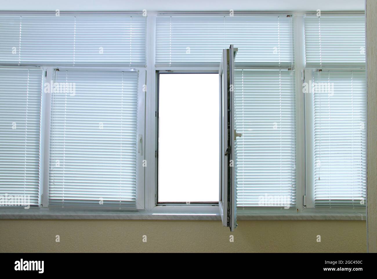 Open balcony window overlooking street Stock Photo - Alamy