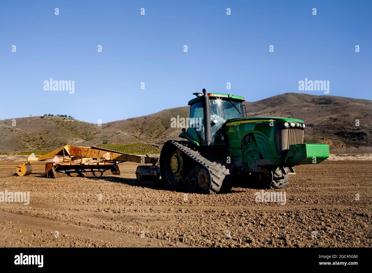 Leveling field for planting Stock Photo Alamy