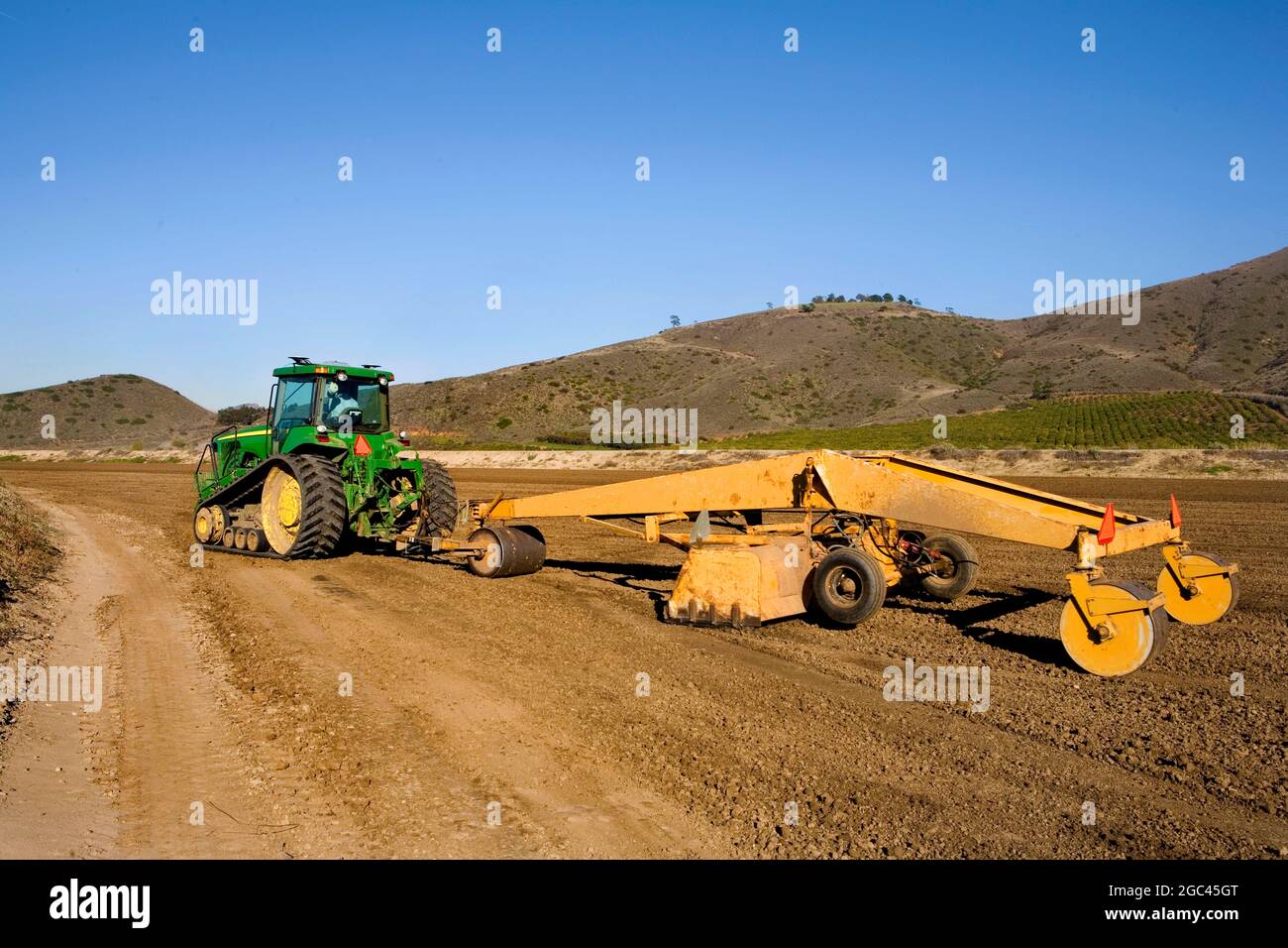 Leveling field for planting Stock Photo Alamy