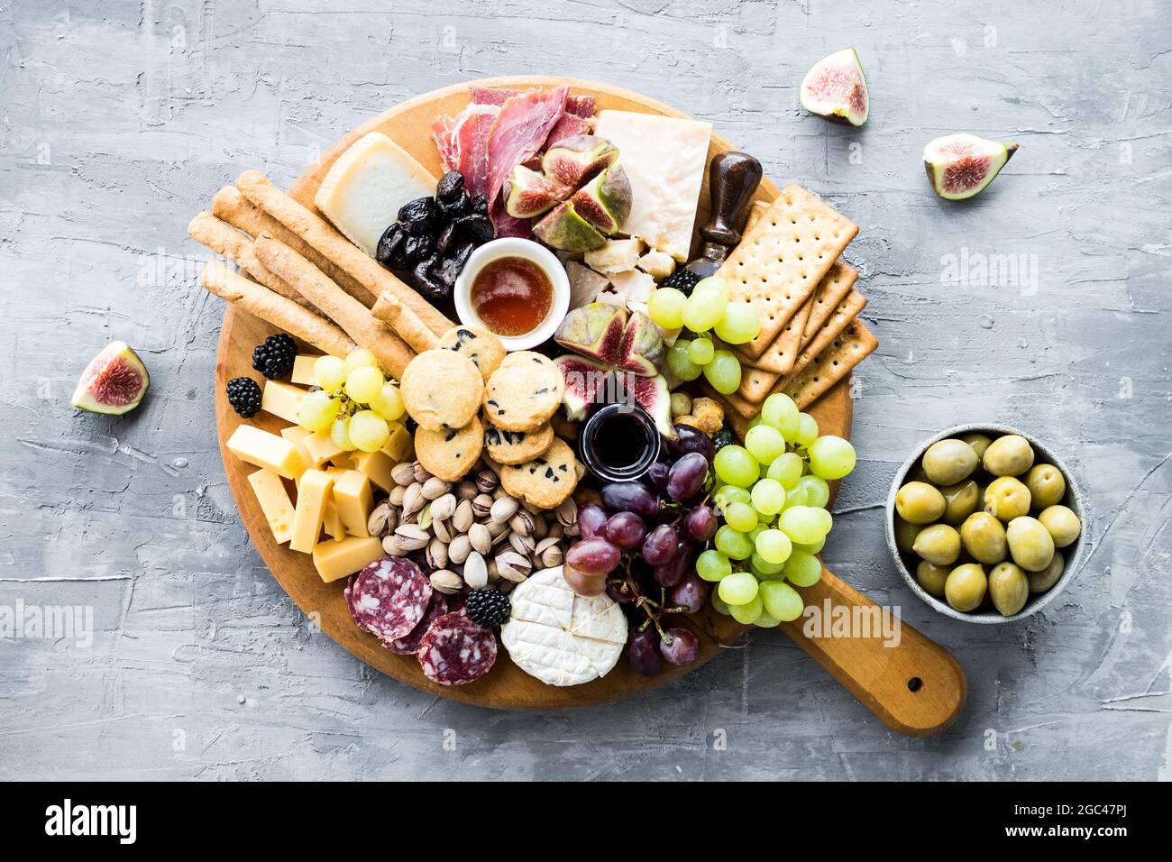 Charcuterie board. Cheese platter Parmesan, maasdam, camembert