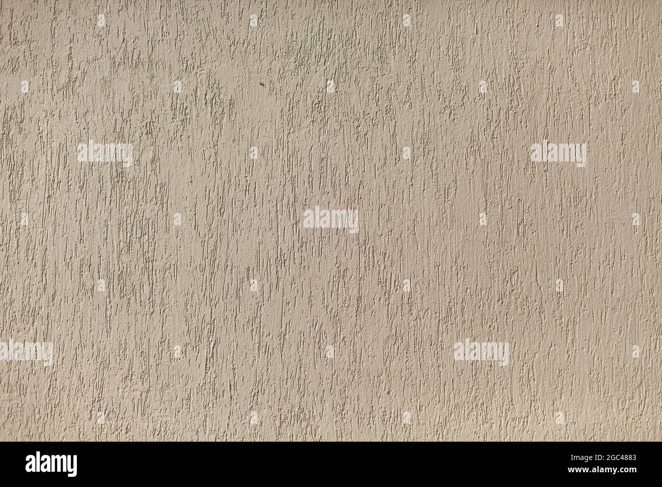Wall Texture Rough Surface Beige Colors In A Painted Wall Stock Photo wall-texture-rough-surface-beige-colors-in-a-painted-wall-stock-photo
