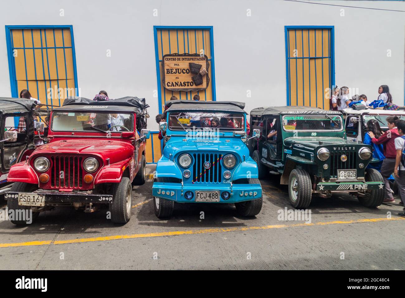 FILANDIA, COLOMBIA - SEPTEMBER 7, 2015: Jeeps are an important part of  rural transportation in Colombia. These are for children travelling from  the sc Stock Photo - Alamy