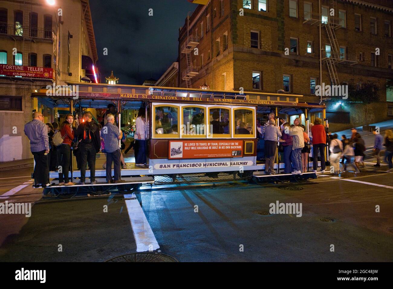Cable car in Chinatown at night, San Francisco, California Stock Photo