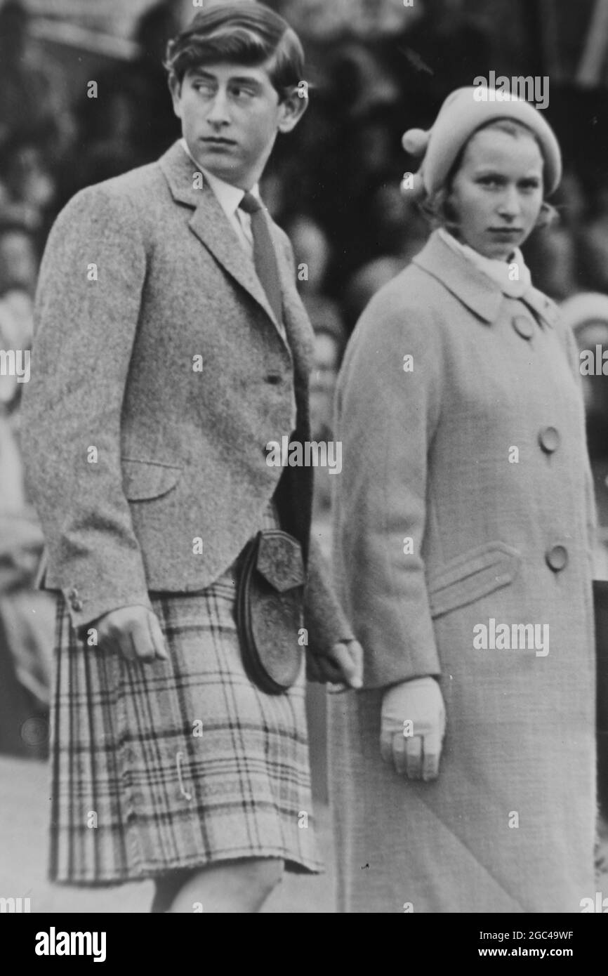 HIGHLAND GAMES ROYALS ATTEND HIGHLAND GAMES IN BRAEMAR, SCOTLAND - PRINCE CHARLES AND PRINCESS ANNE ; 6 SEPTEMBER 1963 Stock Photo