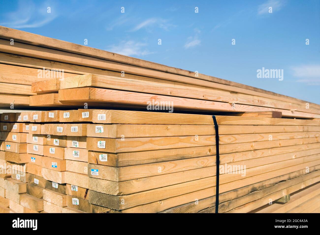 Lumber piles at a construction site Stock Photo