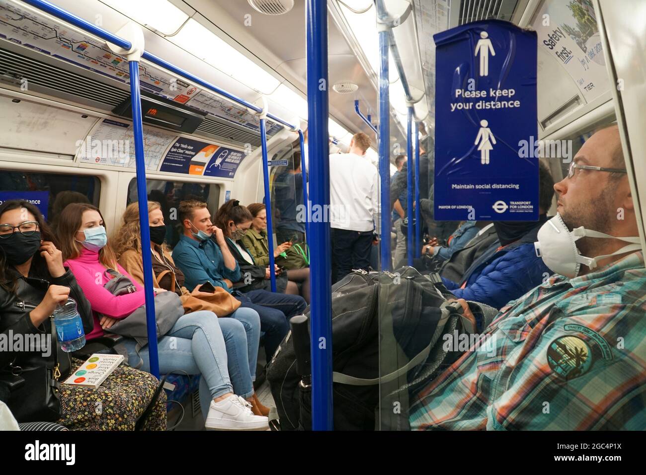 London, UK, 6 August 2021 Passengers (mostly) wear face masks on the