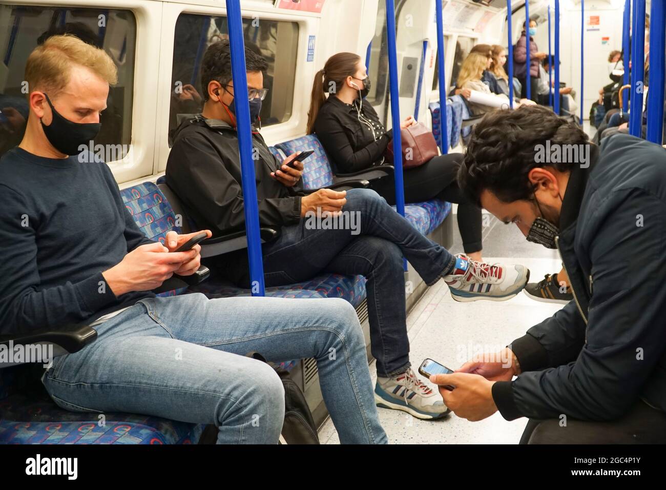 London, UK, 6 August 2021 Passengers (mostly) wear face masks on the