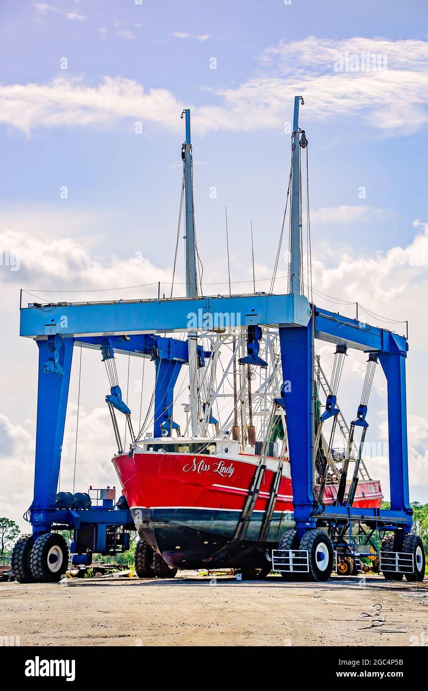 A shrimp boat is hoisted up for repairs, July 13, 2021, in Bayou La Batre, Alabama. Stock Photo