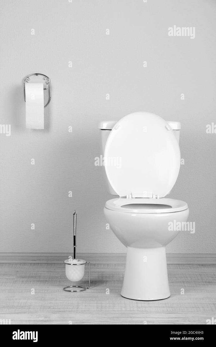 White toilet bowl in a bathroom Stock Photo - Alamy