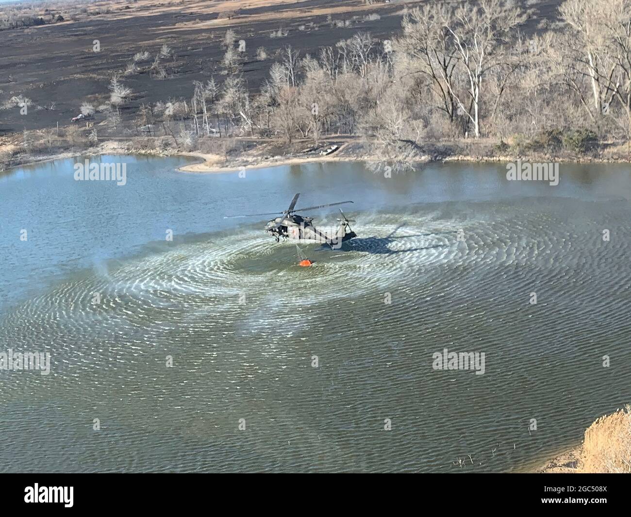 Military helicopter water pickup Stock Photo Alamy