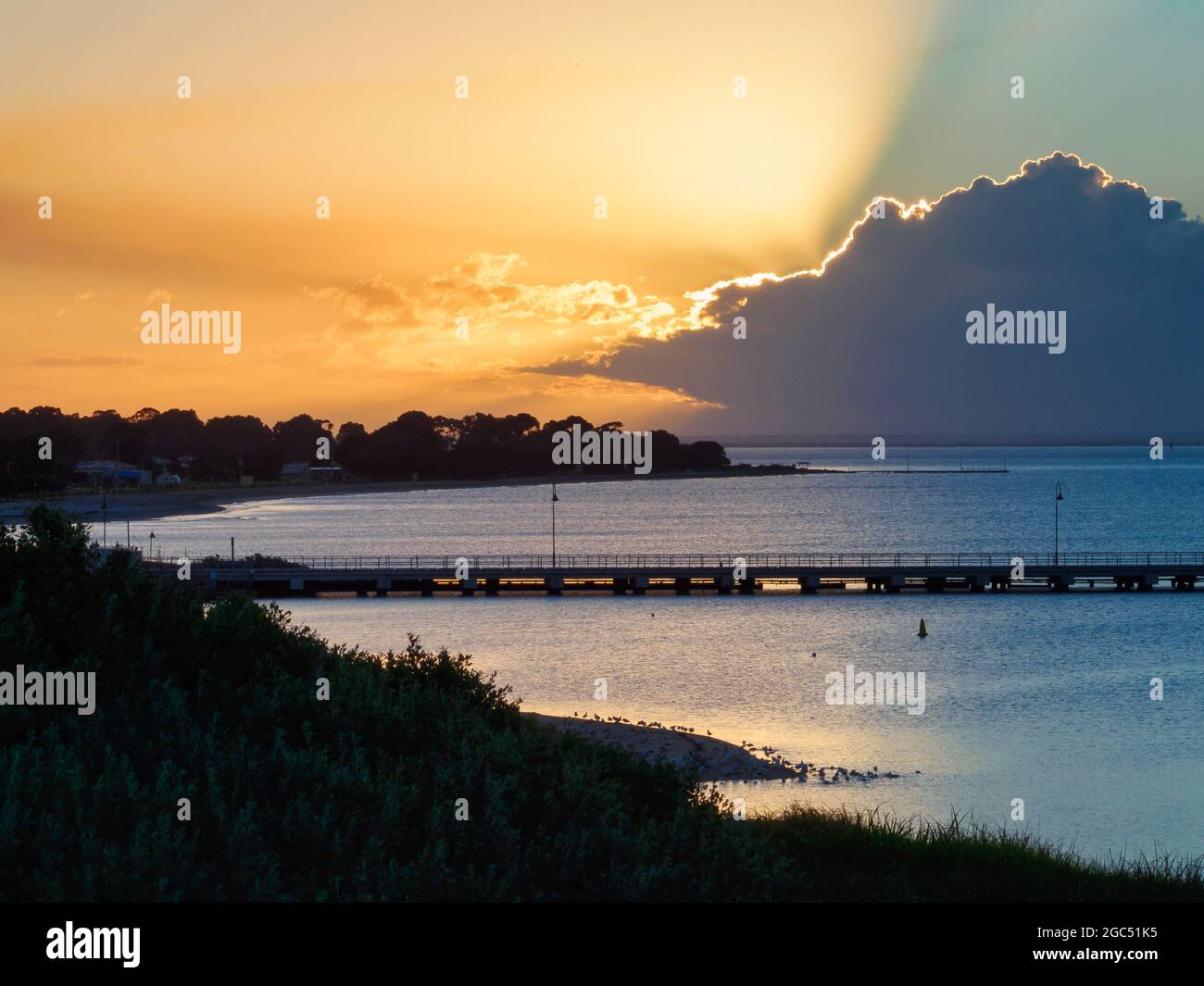 Dramatic sky with the sun behind the clouds - Portarlington, Victoria, Australia Stock Photo