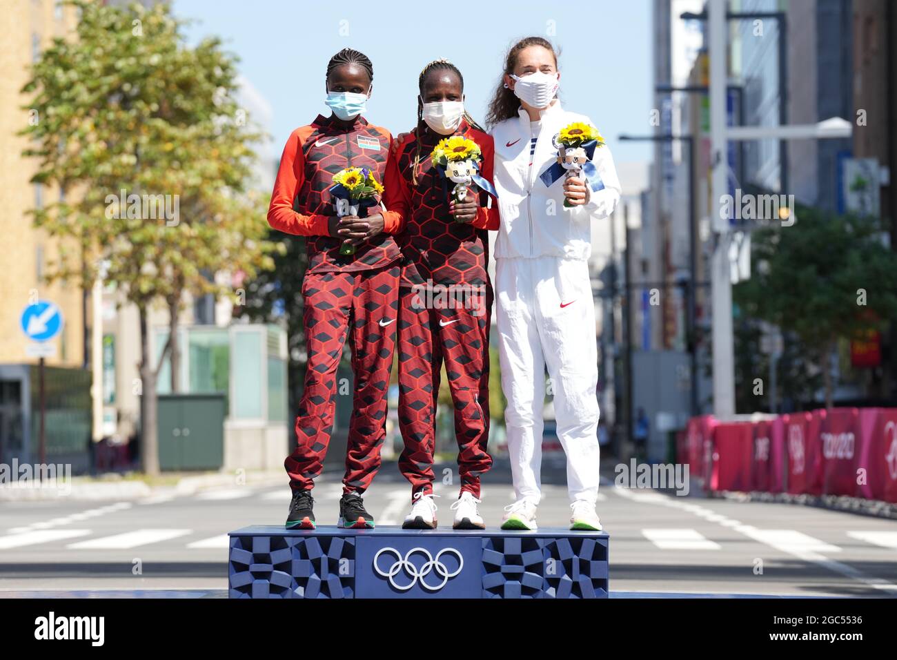 Sapporo Japan 7th Aug 21 Gold Medalist Peres Jepchirchir C Of Kenya Silver Medalist Brigid Kosgei L Of Kenya And Bronze Medalist Molly Seidel Of The United States Pose During The Awarding