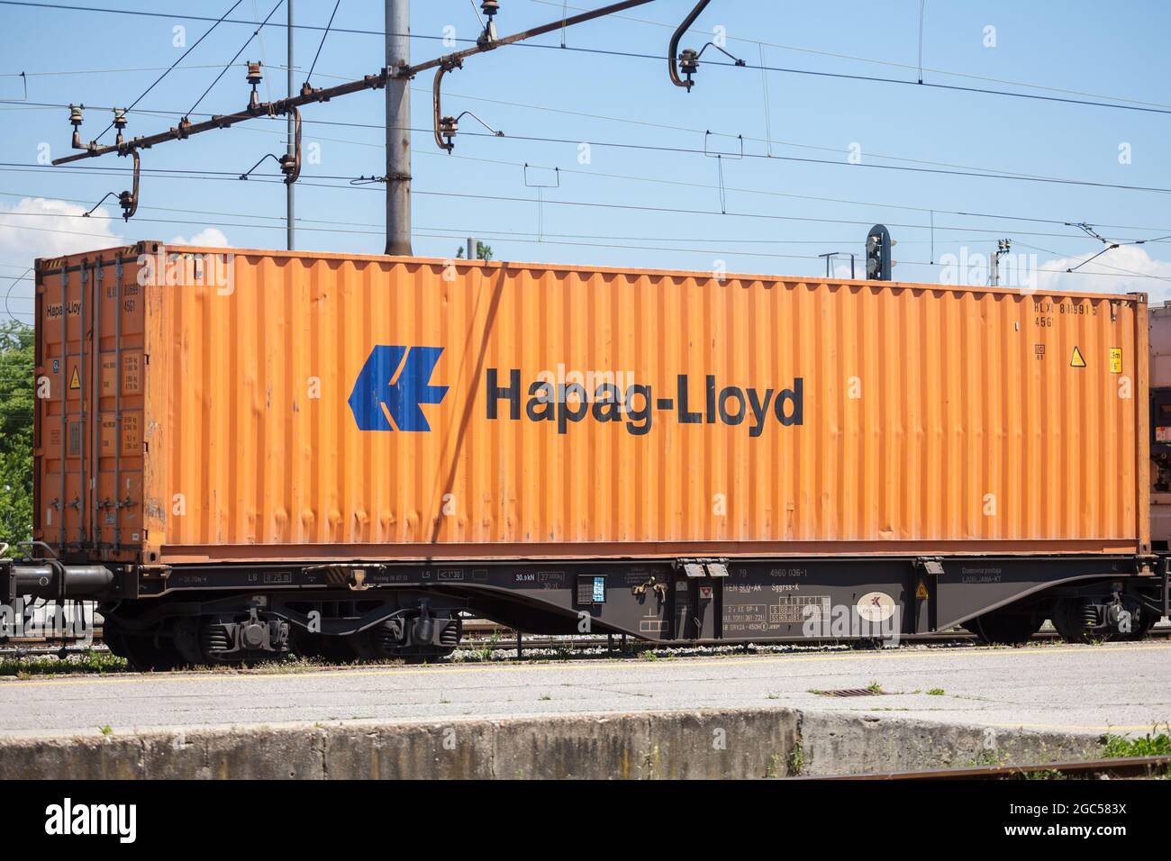 Picture of a sign with the logo of Hapag Lloyd on a container being shipped by rail in Ljubljana, Slovenia. Hapag-Lloyd AG is a German international s Stock Photo