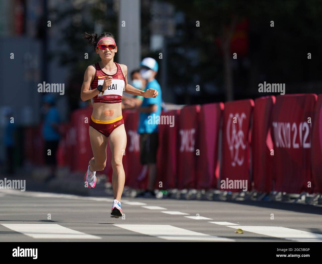 Sapporo, Japan. 7th Aug, 2021. Bai Li of China competes during the women's marathon final at the Tokyo 2020 Olympic Games in Sapporo, Japan, Aug. 7, 2021. Credit: Ju Huanzong/Xinhua/Alamy Live News Stock Photo