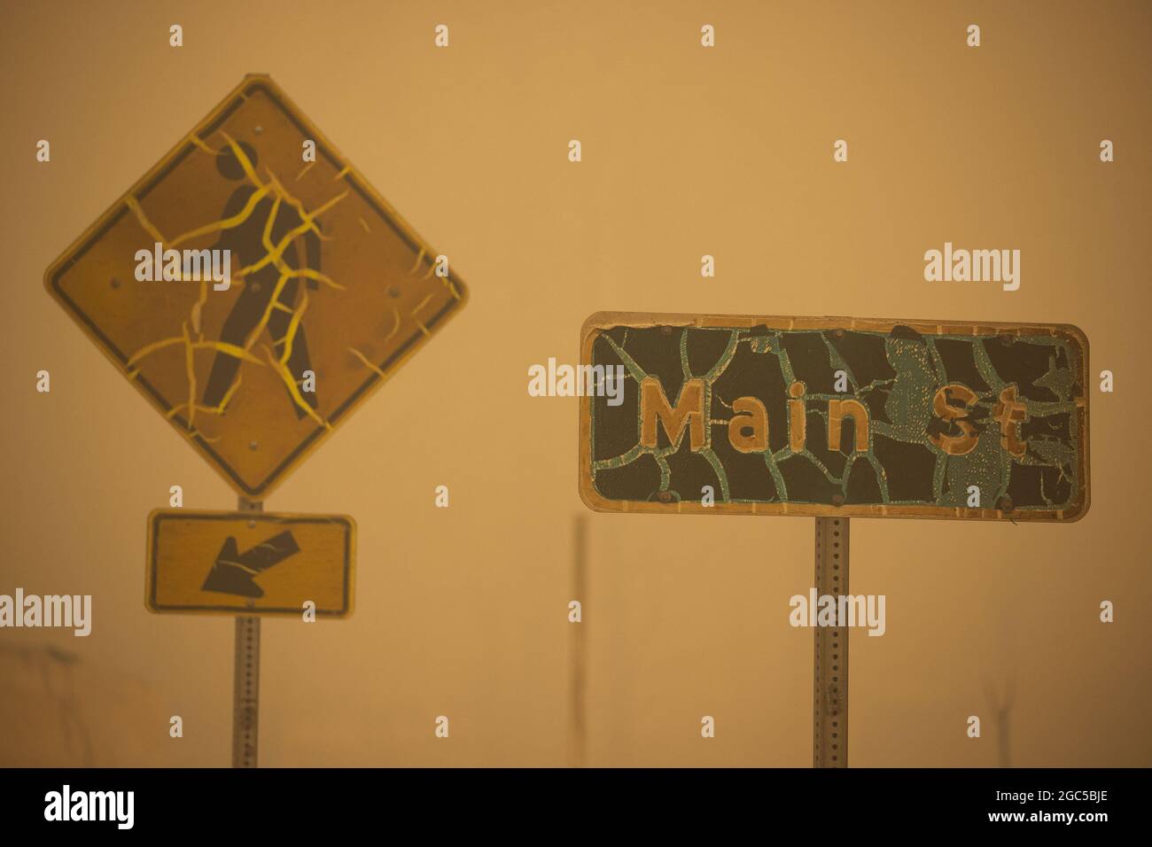 Greenville, USA. 06th Aug, 2021. Fire damaged road signs in the downtown area of Greenville, California after the Dixie fire destroyed the town, Friday August 6, 2021. Photo by Peter DaSilva/UPI Credit: UPI/Alamy Live News Stock Photo