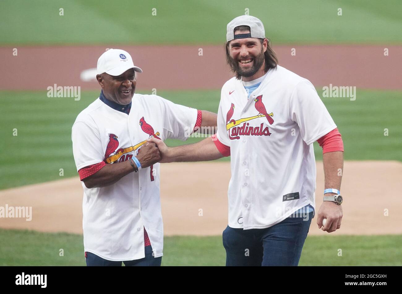 Tampa Bay Lightning's Pat Maroon (R) shakes hands with National